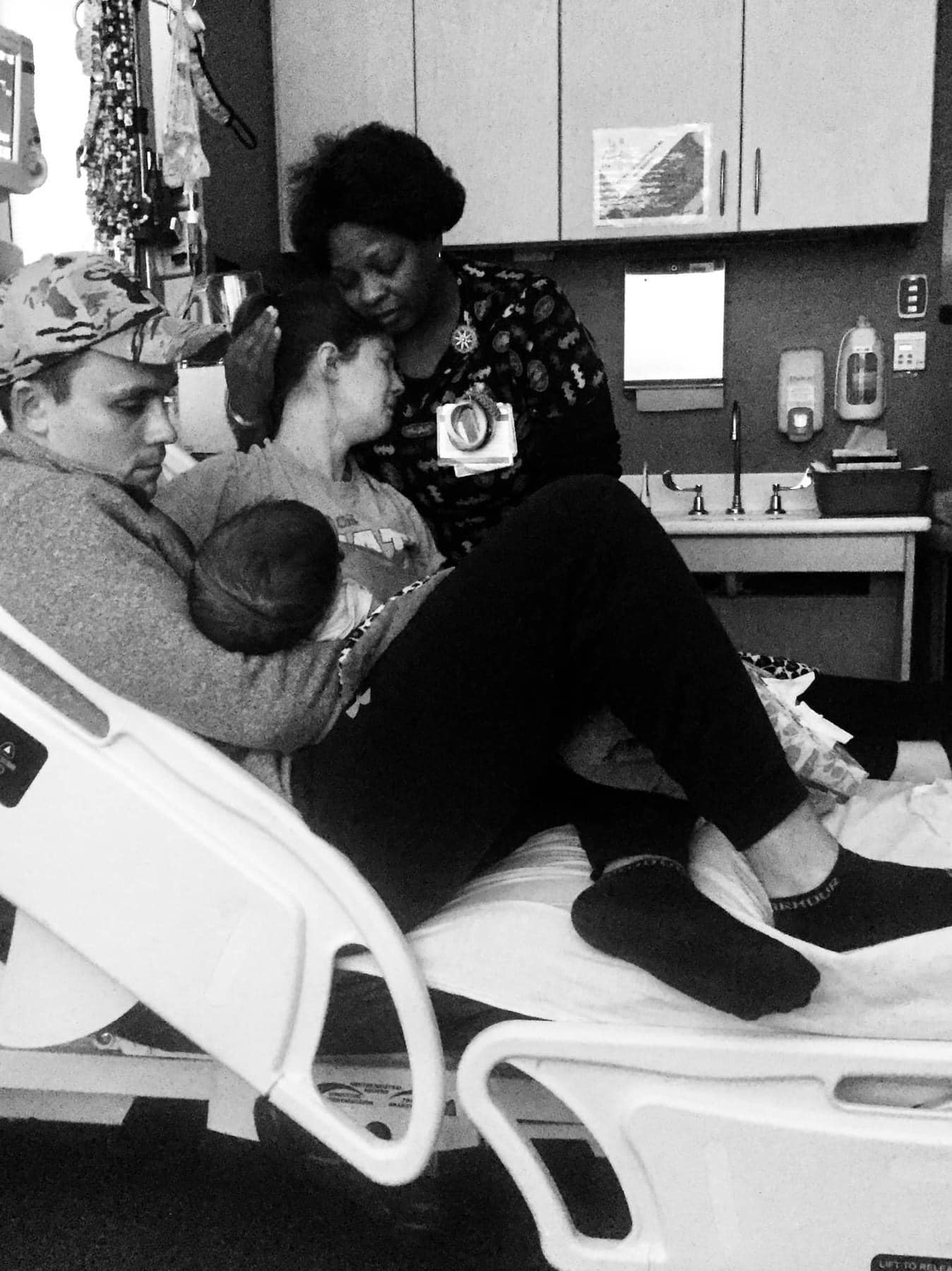 Jonathan and Shelby SKiles holding baby Sophie in the hospital